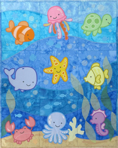 Aquatic Adventures Tiling software provides nine differe sea creatures designs, for each 7X9" tile. Combined together these tiles make a love quilt or wall hanging.