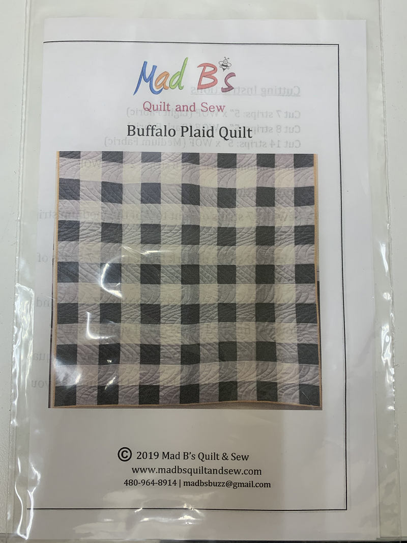 Cuddle by the fire in this simple squares plaid quilt. A great pattern for flannel or wool. Finished Size 58