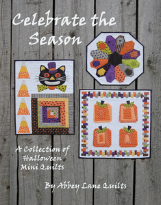 A collection of Halloween mini quilts to celebrate halloween. From pumpkins and candy corn to a fun halloween cat.