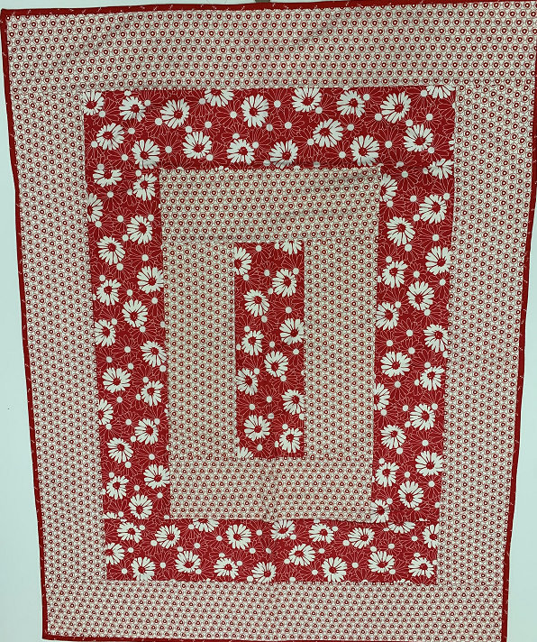 Red and White Floral Quilt