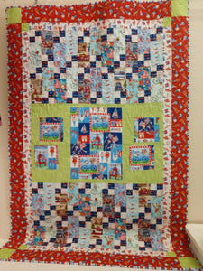 Enjoy this whimsical quilt at your next summer picnic! Measures 45" x 68"