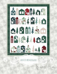 Wrap Christmas Holidays up with this Winder Wonderland quilt. Rows of houses and trees created in winter colors. Finished Size: 45" X 55"